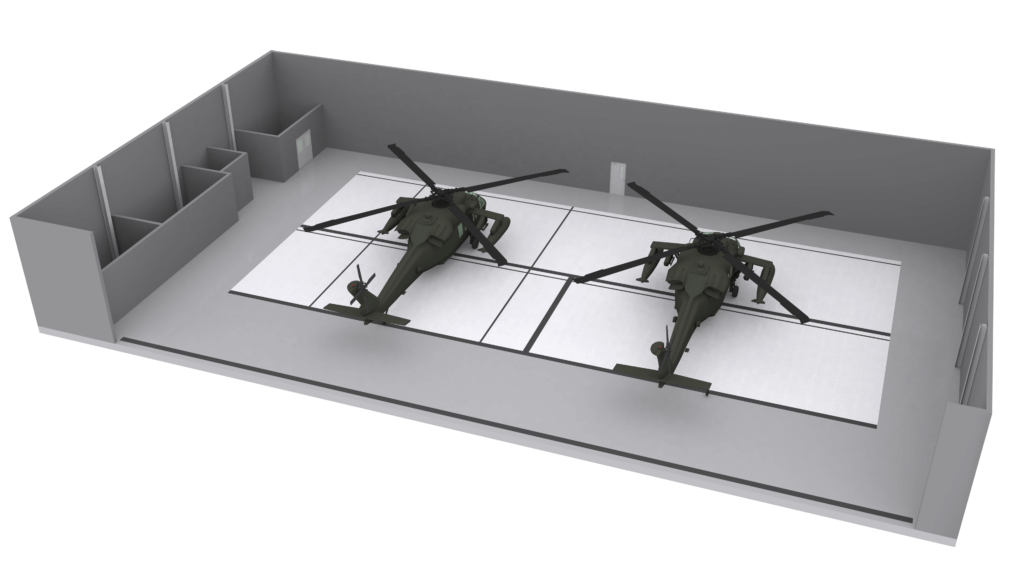 Two helicopters parked in a spacious hangar on Safespill mats designed for liquid containment.