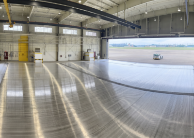 ILDFA in hangar with the bay door open.